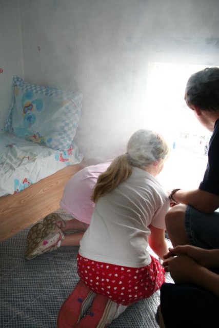 Children exiting the Fire Safety trailers &quot;smoke filled bedroom&quot; 2006